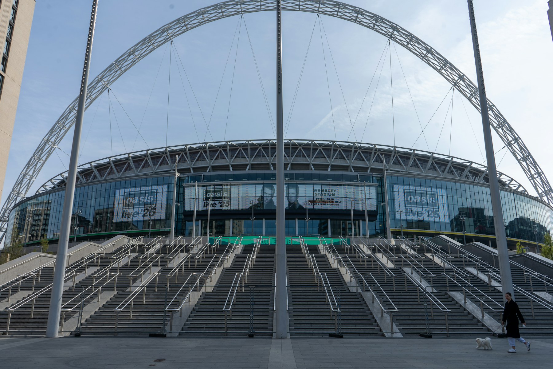 Wembley Stadium and its iconic arch beneath a clear London sky